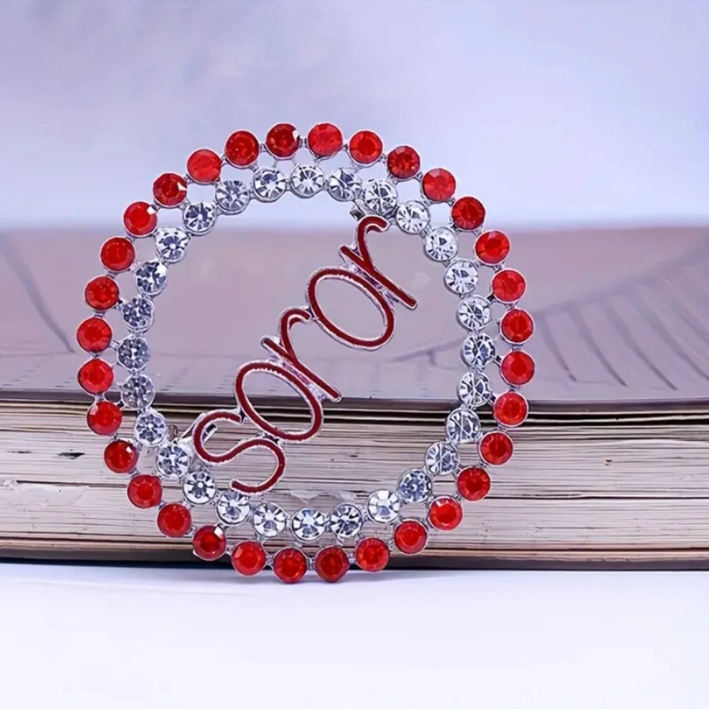 (New in package)Red and Silver Delta Brooch